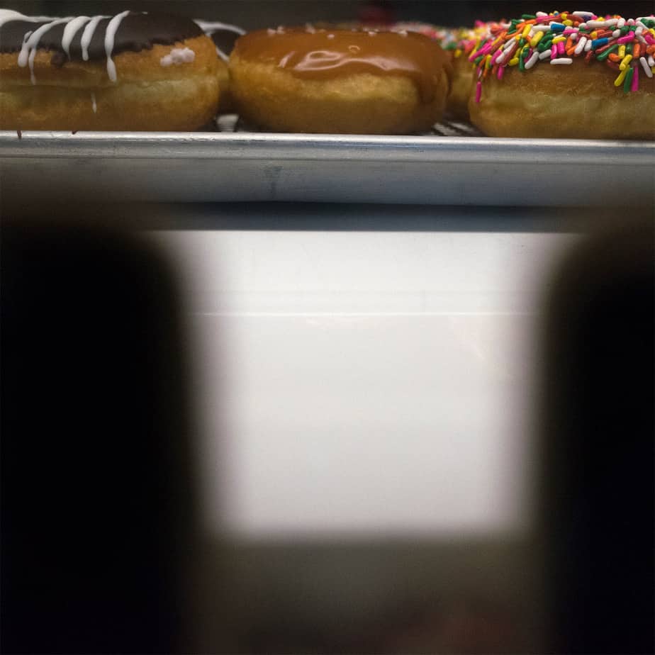 obscure image: donuts on a theater stage