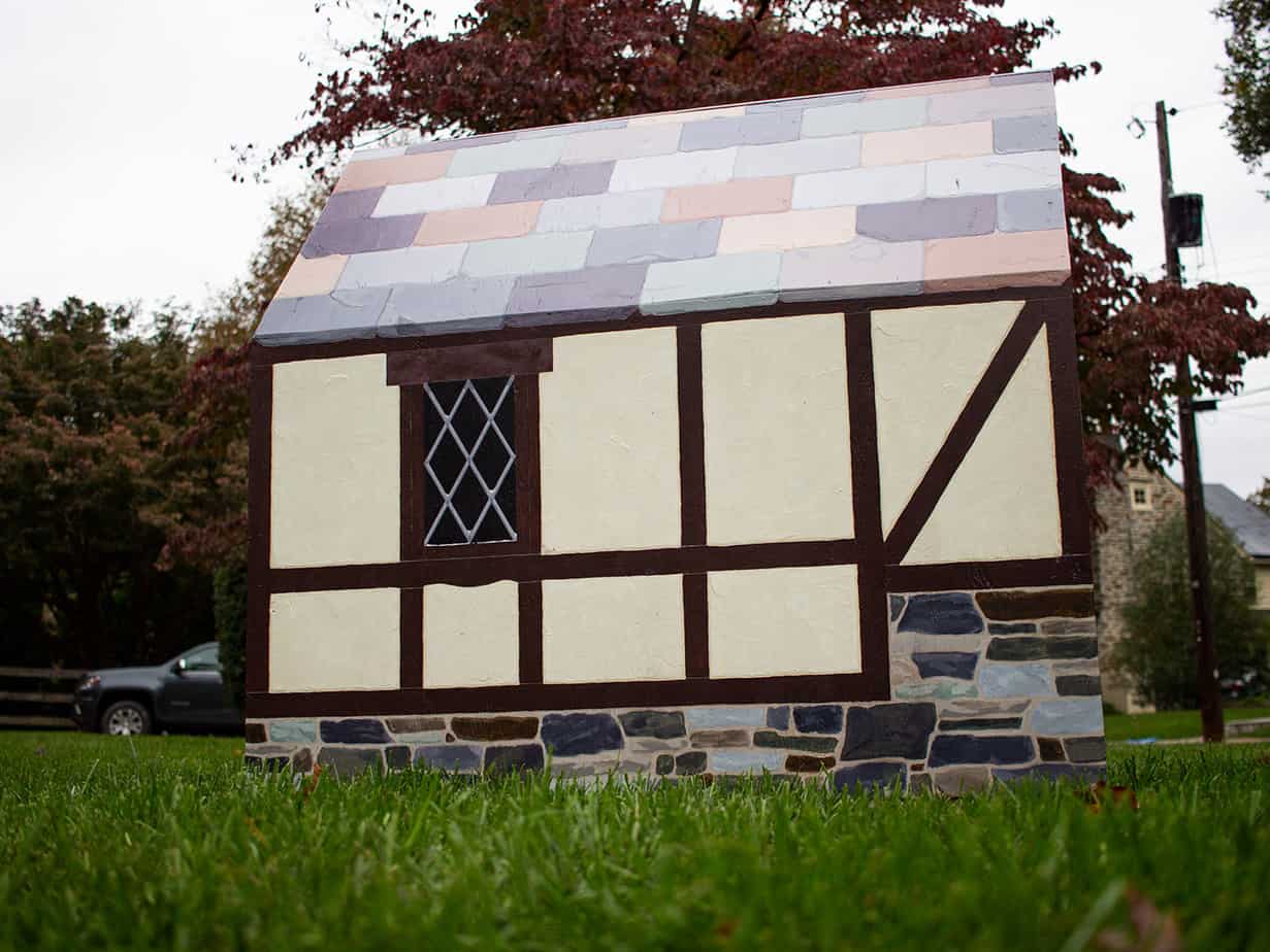 painted dog house in a Tudor Style